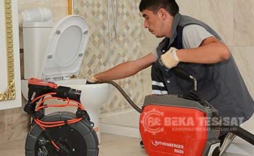 Robotla cihazla tuvalet acma